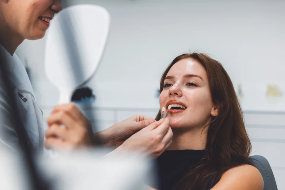 Dentist Uses Shade Guide to Match Tooth Color During a Dental Veneers Consultation in Pittsburgh, PA